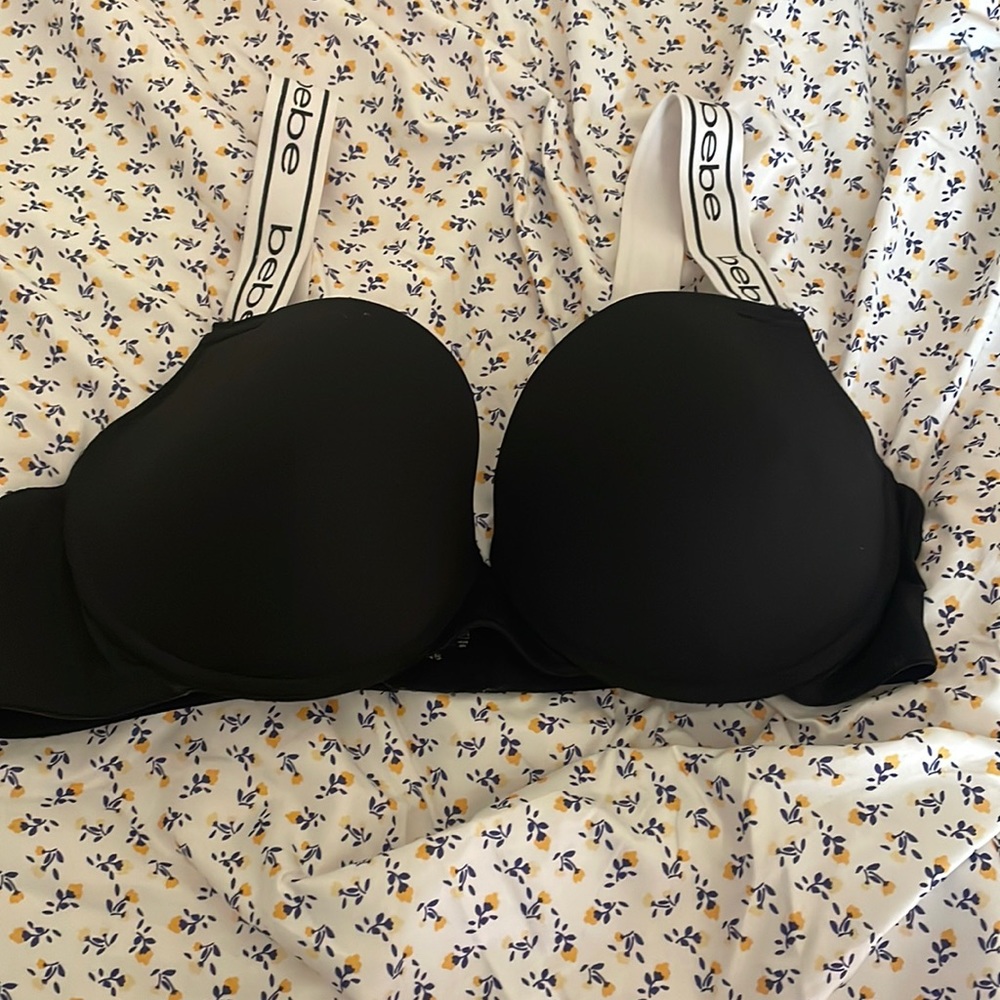 Bebe bra it’s black with white writing that says Bebe on the strap.Wore maybe 2